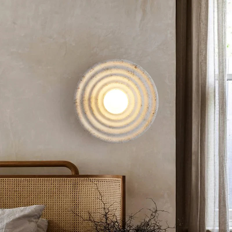 Applique murale ronde un lit marron