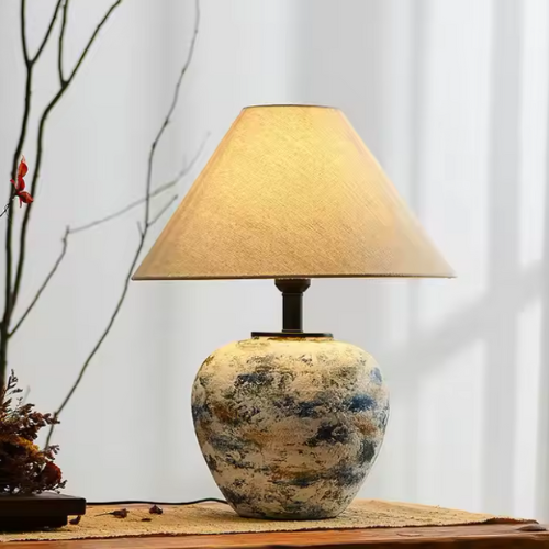 Lampe à poser céramique et une plante