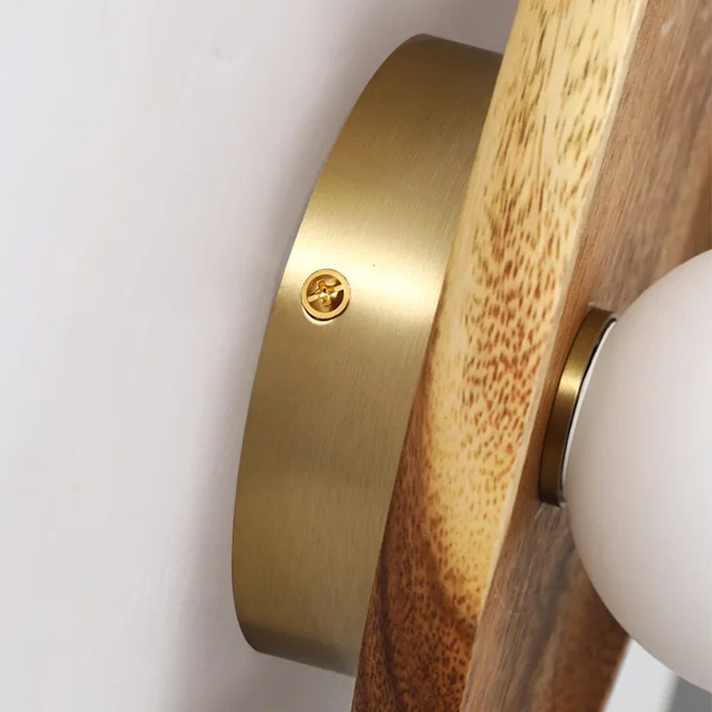 Métal doré de l'applique murale en bois perle lumineuse