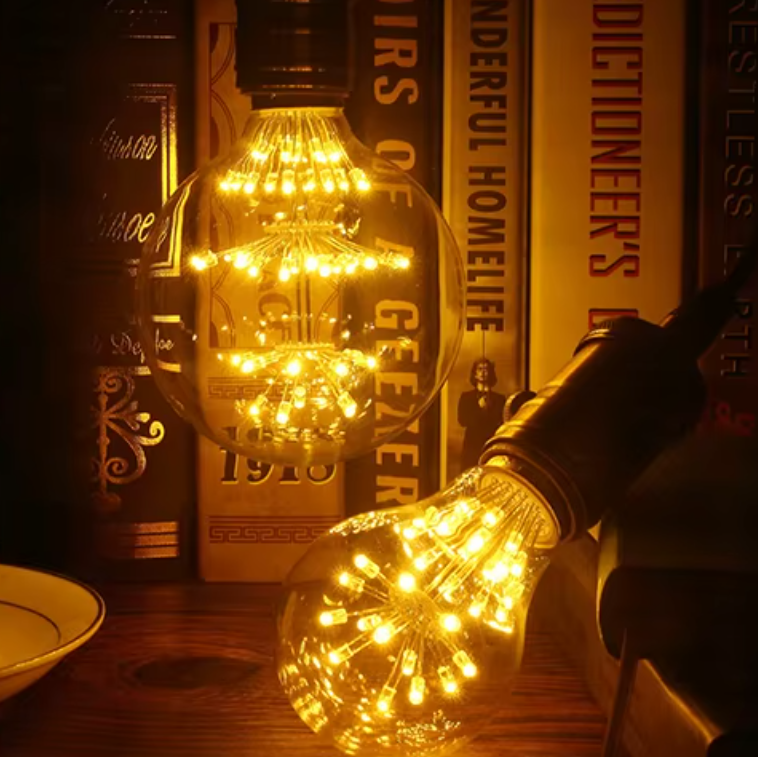  Ampoule vintage feu d'artifice allumé et des livres 