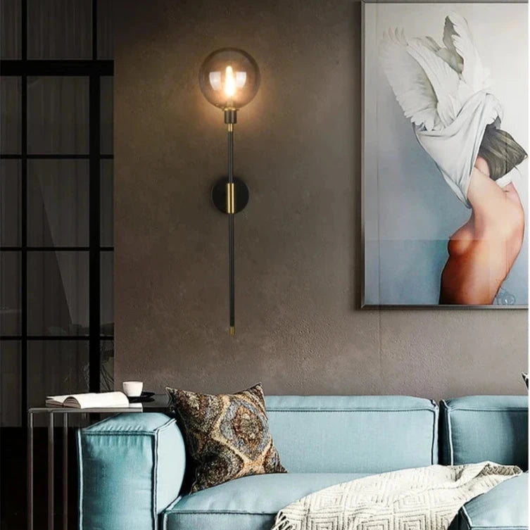 Applique murale globe en verre moderne fauteuil bleu et cadre 