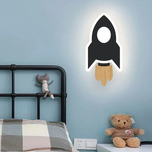 Applique murale led fusé dans une chambre d'enfant  