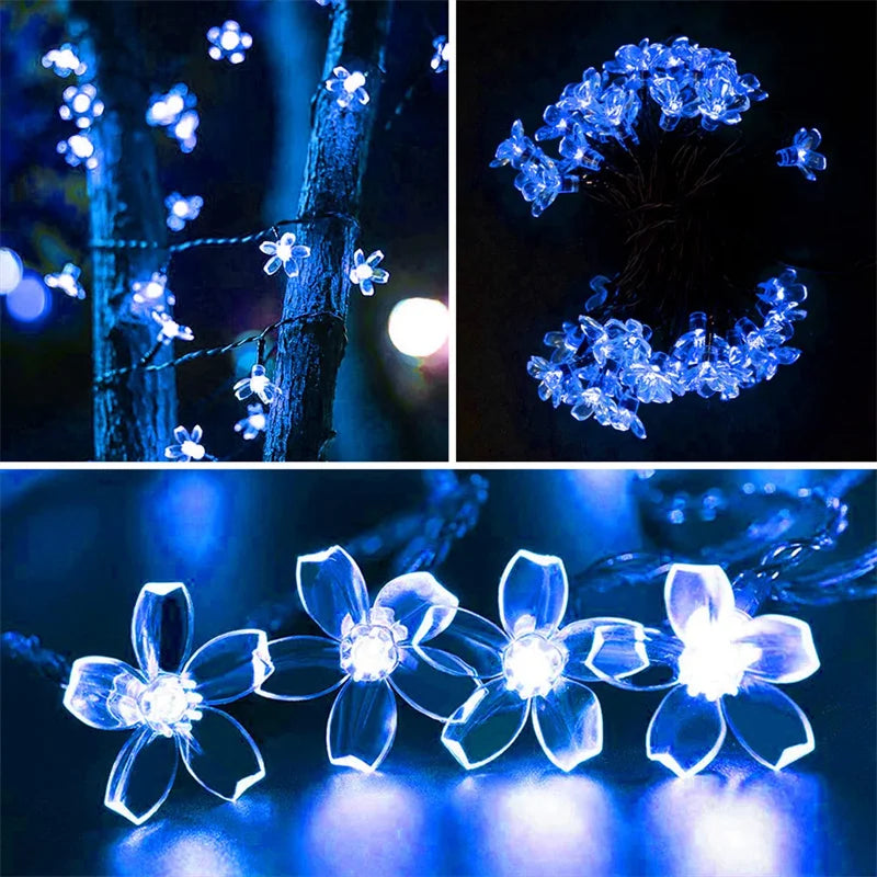 Guirlande lumineuse extérieur LED fleurs de cerisier bleu autour d'un arbre 