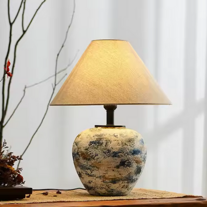 Lampe à poser céramique et une plante 