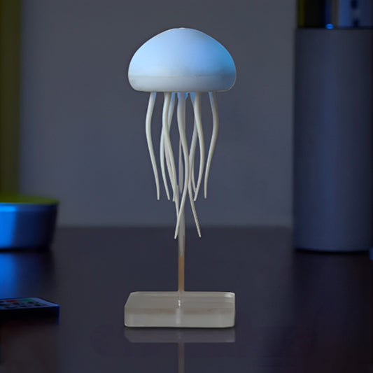  Lampe de chevet design allumé en bleu sur bureau 