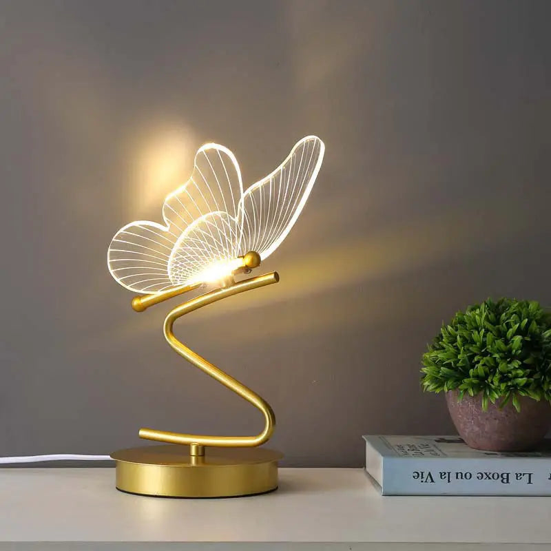  Lampe de chevet papillon dorée un livre et un pot de fleur 
