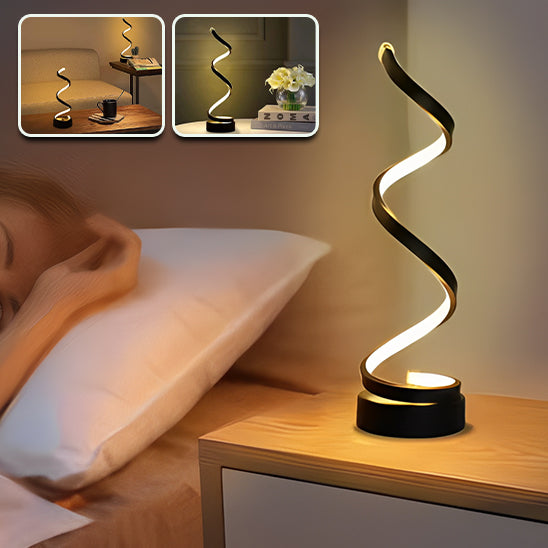 Lampe de table design spirale et une femme qui dore 