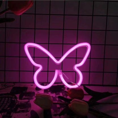 Lampe led néon papillon sur bureau 
