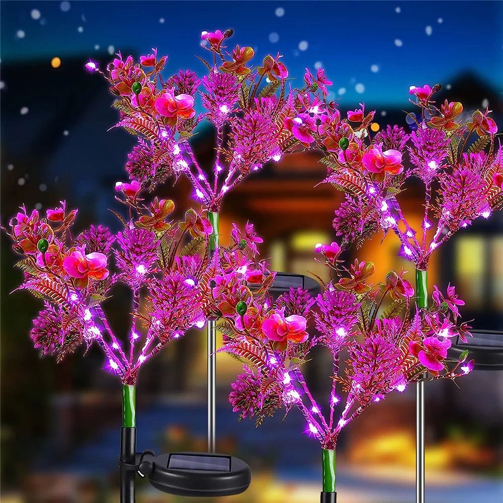 Lampe solaire extérieur en forme d'orchidée violette allumé 