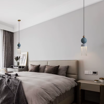 Suspension led en forme de macaron de part et d'autre d'un lit 