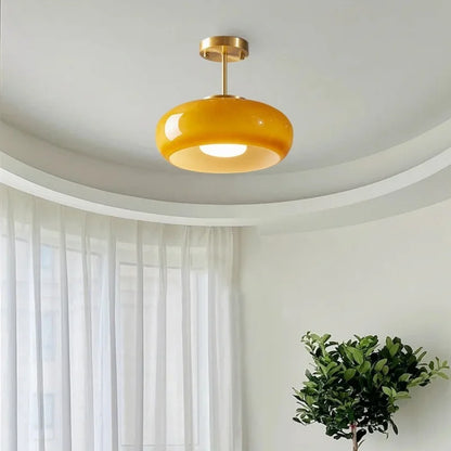 Suspension orange avec bras doré 