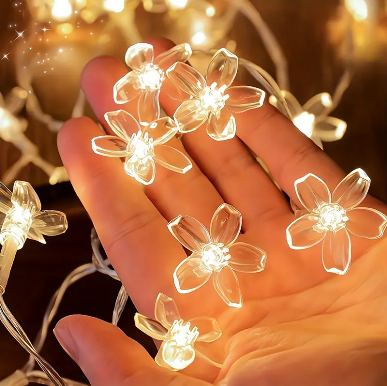 Une main avec guirlande lumineuse extérieur LED 