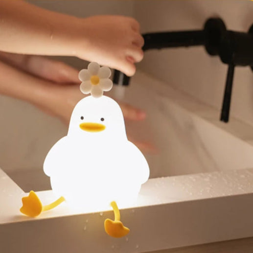 Veilleuse LED canard cute dans une salle de bain 